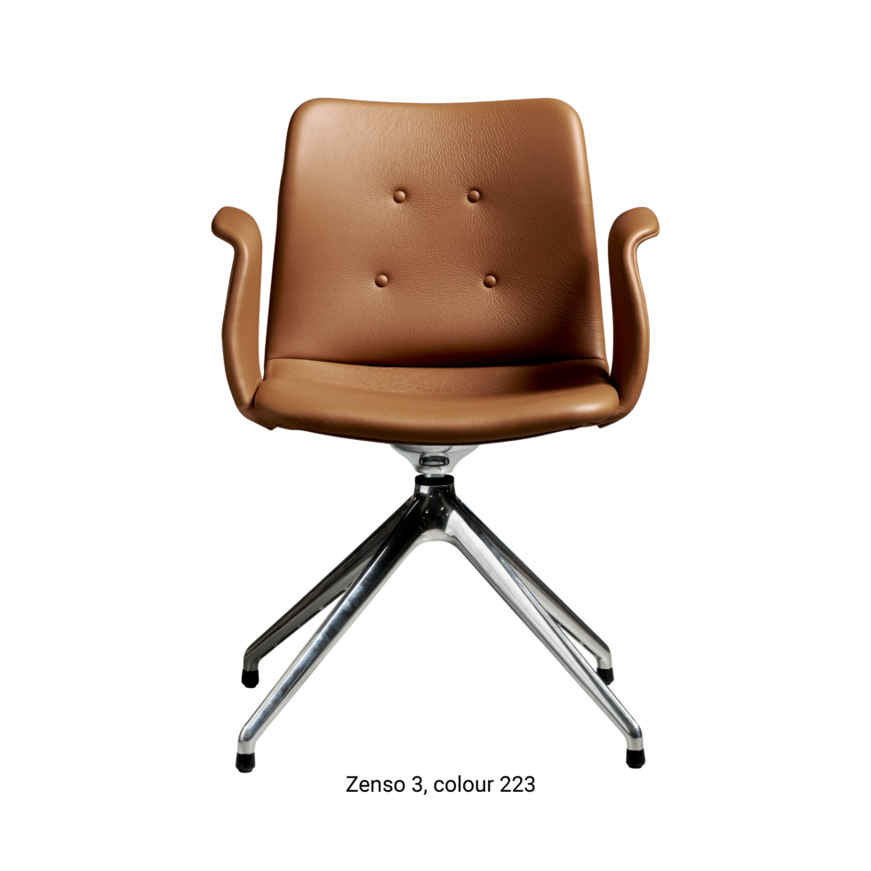 Primum Chair with cognac leather upholstery, featuring a padded seat and a flexible backrest for maximum comfort during long dinners or workdays.
